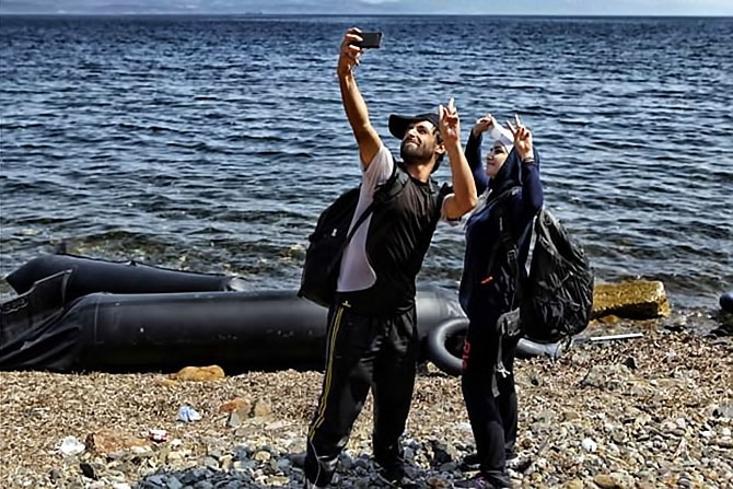 Fotoğraflarla hedefe ulaşan sığınmacıların sevinci galerisi resim 11