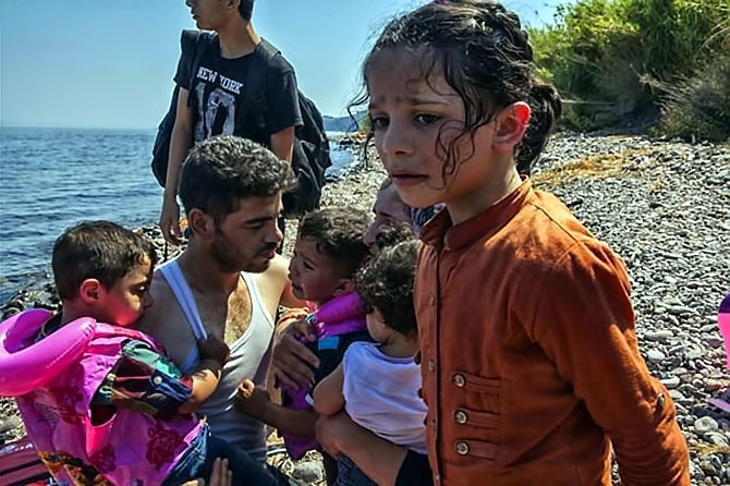 Fotoğraflarla hedefe ulaşan sığınmacıların sevinci galerisi resim 5