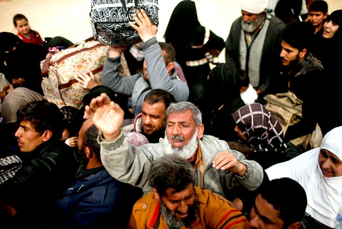 Reuters objektifinden Musul’dan kaçış galerisi resim 5