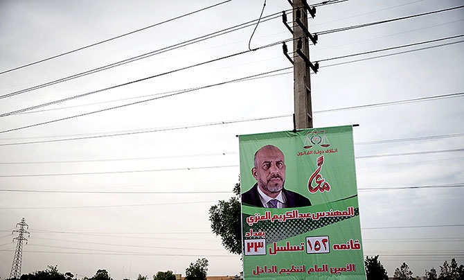 Irak Meclis adaylarının afişleri Tahran sokaklarında galerisi resim 1