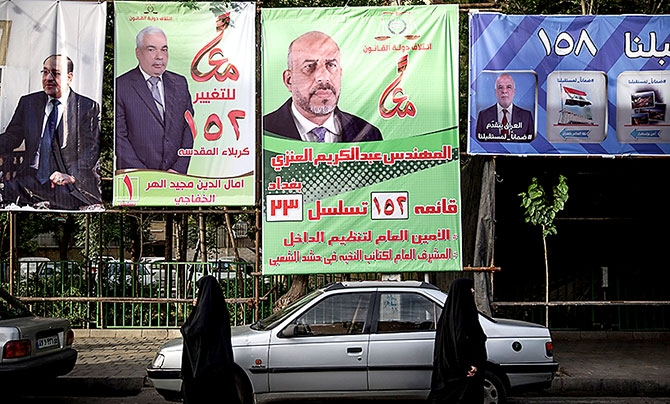 Irak Meclis adaylarının afişleri Tahran sokaklarında galerisi resim 12