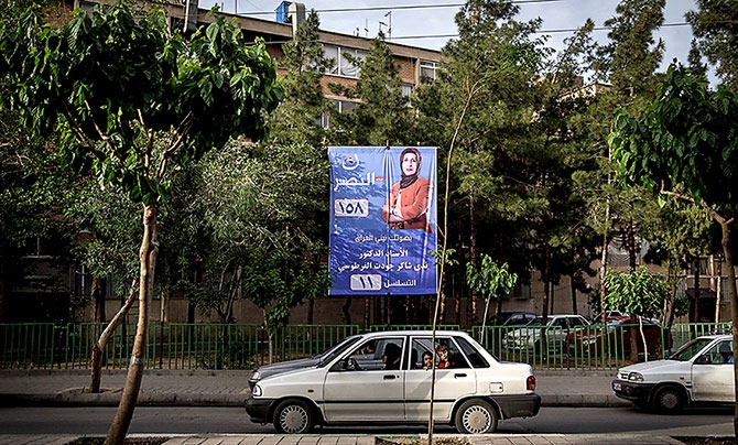 Irak Meclis adaylarının afişleri Tahran sokaklarında galerisi resim 14