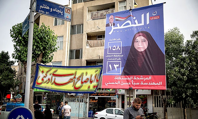 Irak Meclis adaylarının afişleri Tahran sokaklarında galerisi resim 15