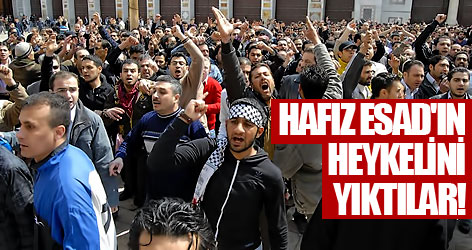 Hafız Esad'ın heykelini böyle yıktılar!