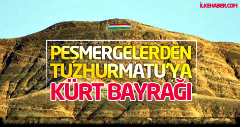 Peşmergelerden Tuzhurmatu'ya Kürt bayrağı