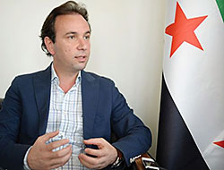 SMDK'nin yeni başkanı: Esad'la masaya oturmayız