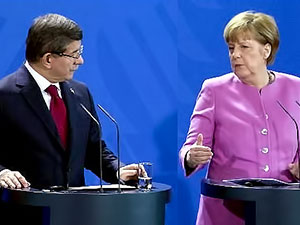 Davutoğlu ve Merkel'den NATO'ya çağrı