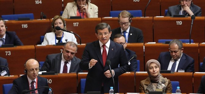 AP'de Kürkçü sordu, Davutoğlu cevapladı