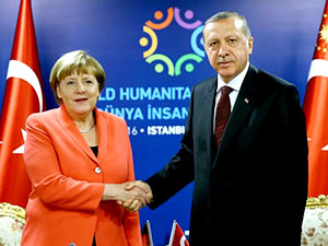 Merkel'den Erdoğan'a vize muafiyeti uyarısı