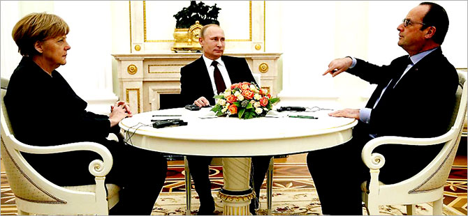 Merkel, Hollande ve Putin Suriye'yi görüştü