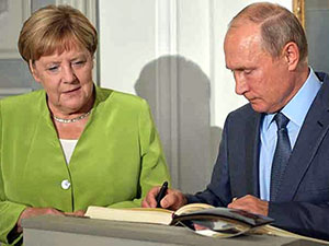 Putin ile Merkel biraraya geldi