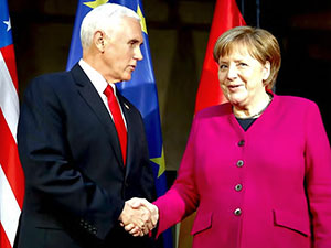 Merkel ve Pence'den karşılıklı sert açıklamalar