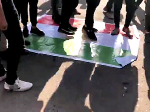 Bağdat’ta Haşdi Şabi yanlıları Kürdistan Bayrağı’nı yaktı