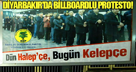 Diyarbakır'da 'Dün Halepçe bu gün kelepçe' afişleri