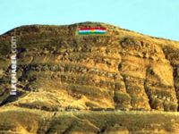Peşmergelerden Tuzhurmatu'ya Kürt bayrağı